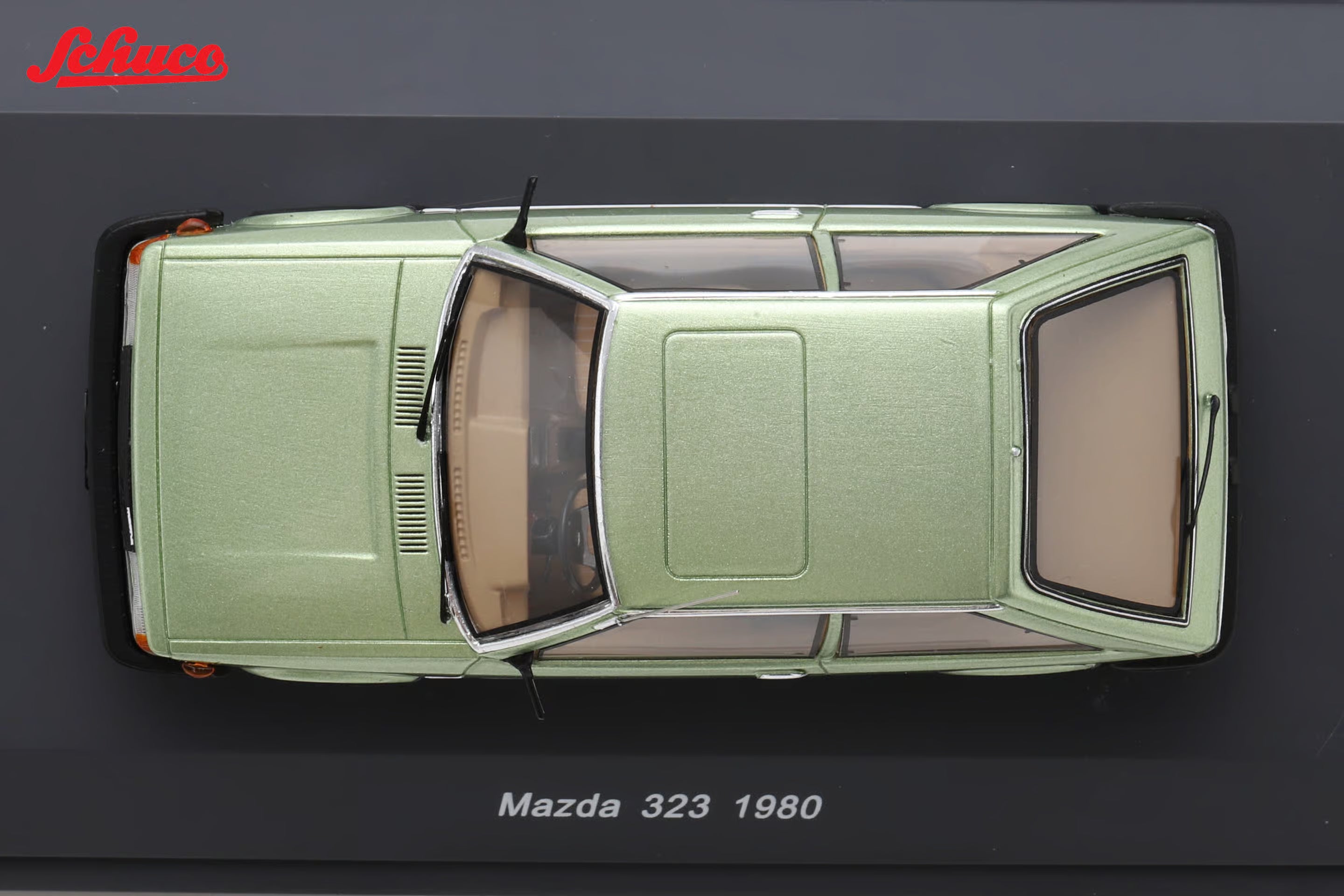 Mazda 323 light met green (Euro version) 1:43
