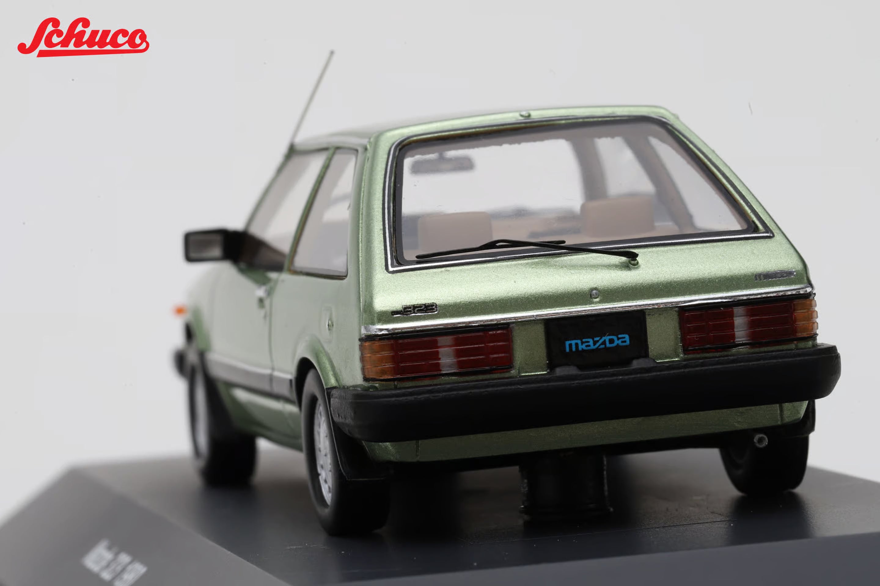 Mazda 323 light met green (Euro version) 1:43