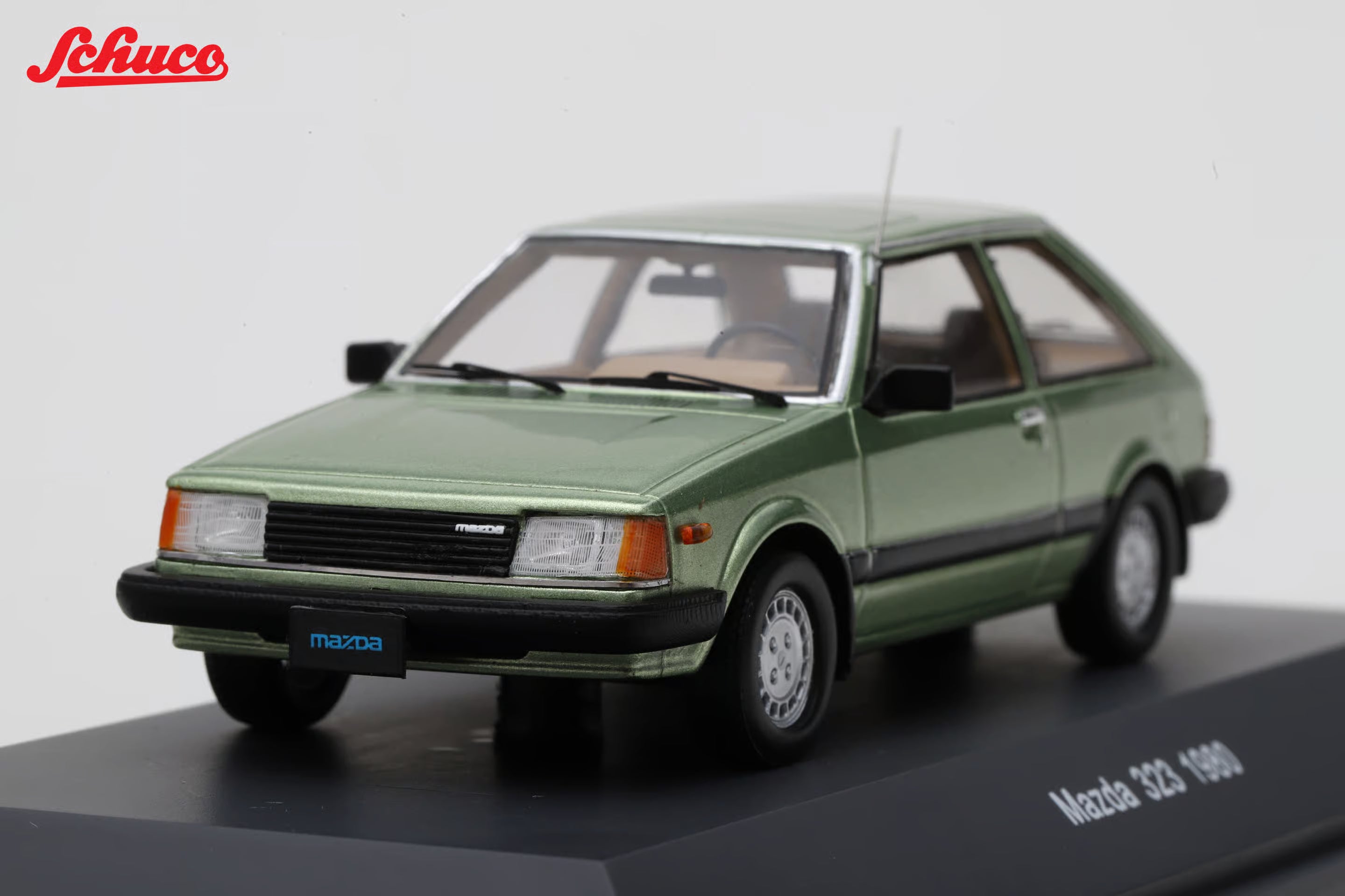 Mazda 323 light met green (Euro version) 1:43