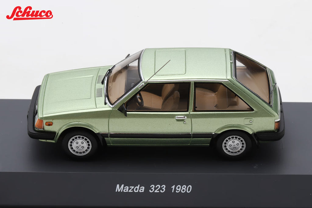 Mazda 323 light met green (Euro version) 1:43