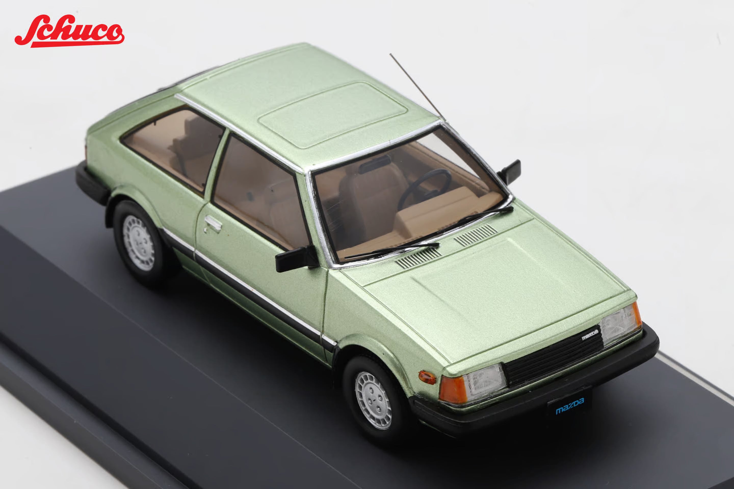 Mazda 323 light met green (Euro version) 1:43