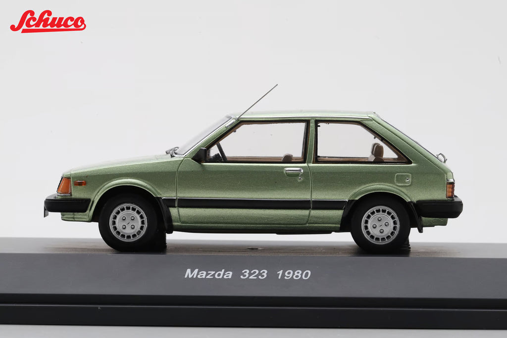 Mazda 323 light met green (Euro version) 1:43