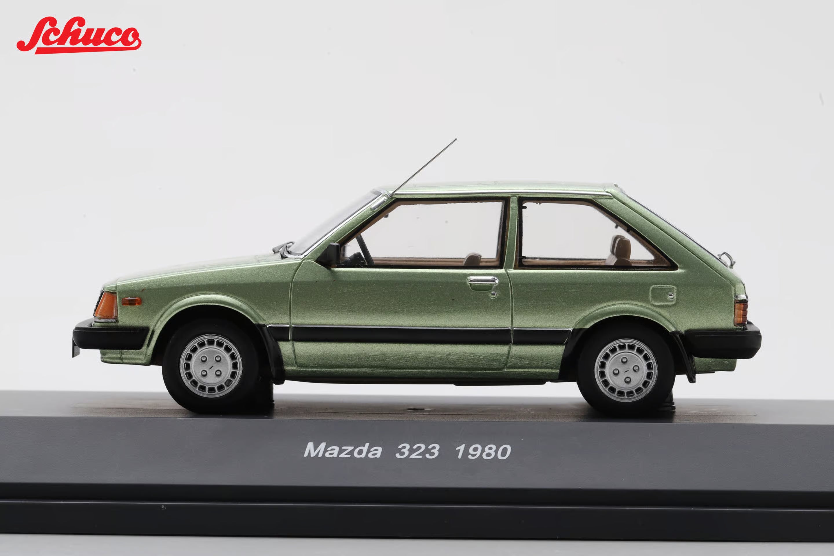 Mazda 323 light met green (Euro version) 1:43