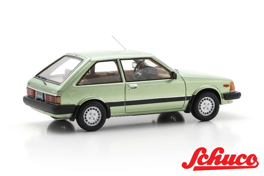 Pre-Order - Mazda 323 light met green (Euro version) 1:43