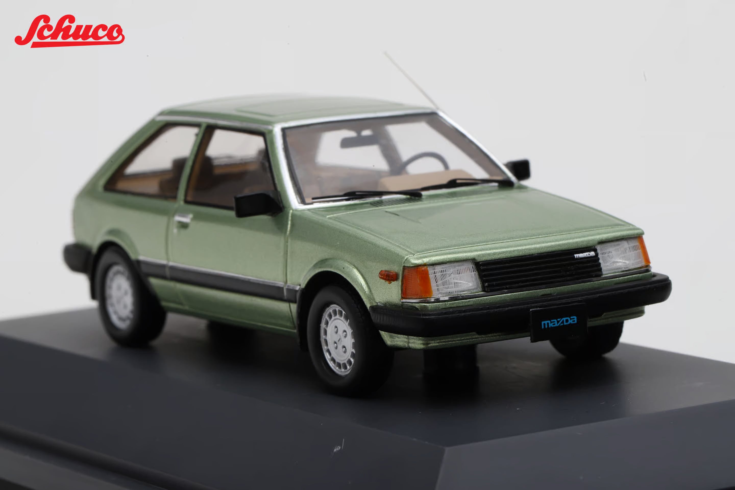 Mazda 323 light met green (Euro version) 1:43