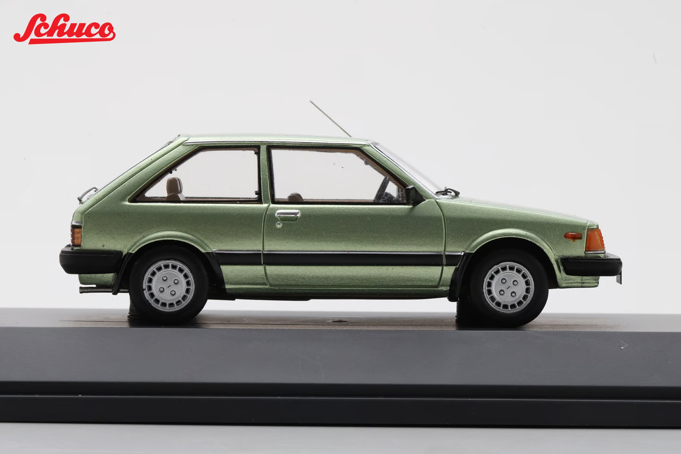 Mazda 323 light met green (Euro version) 1:43