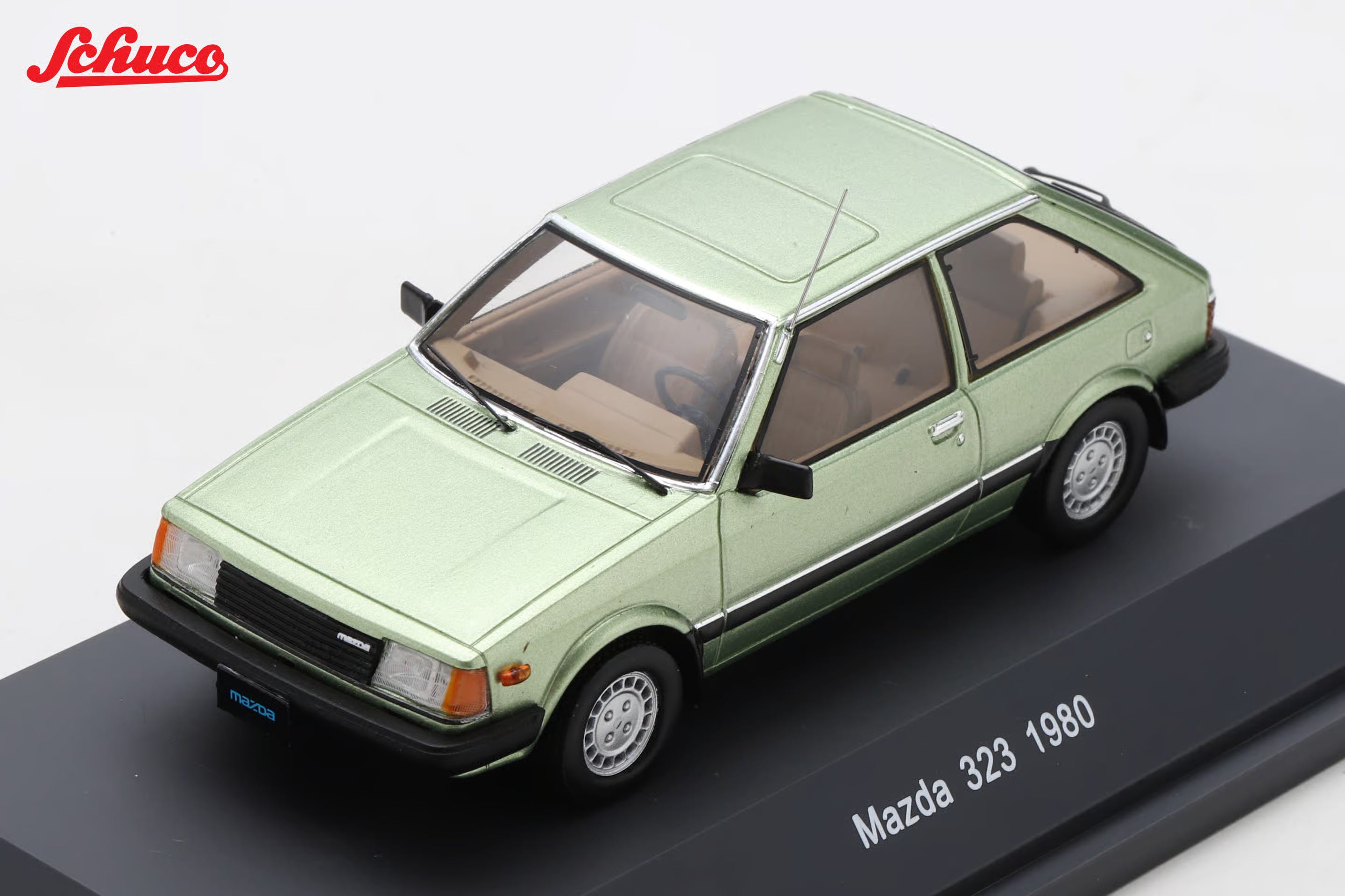 Mazda 323 light met green (Euro version) 1:43