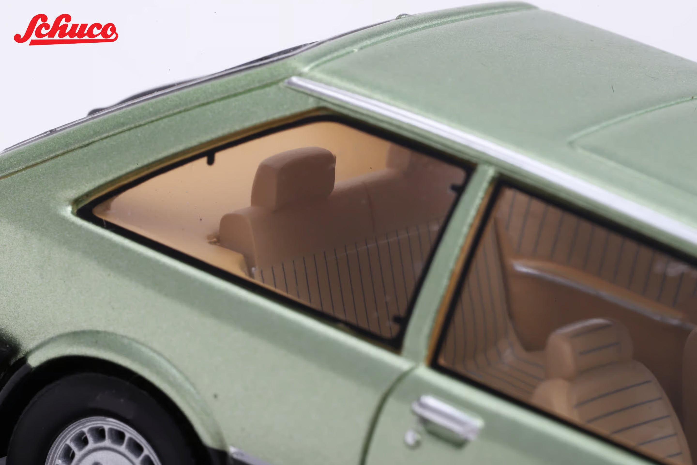 Mazda 323 light met green (Euro version) 1:43
