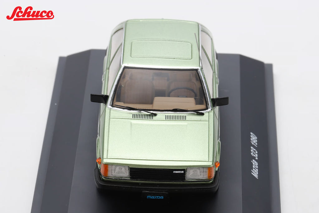Mazda 323 light met green (Euro version) 1:43