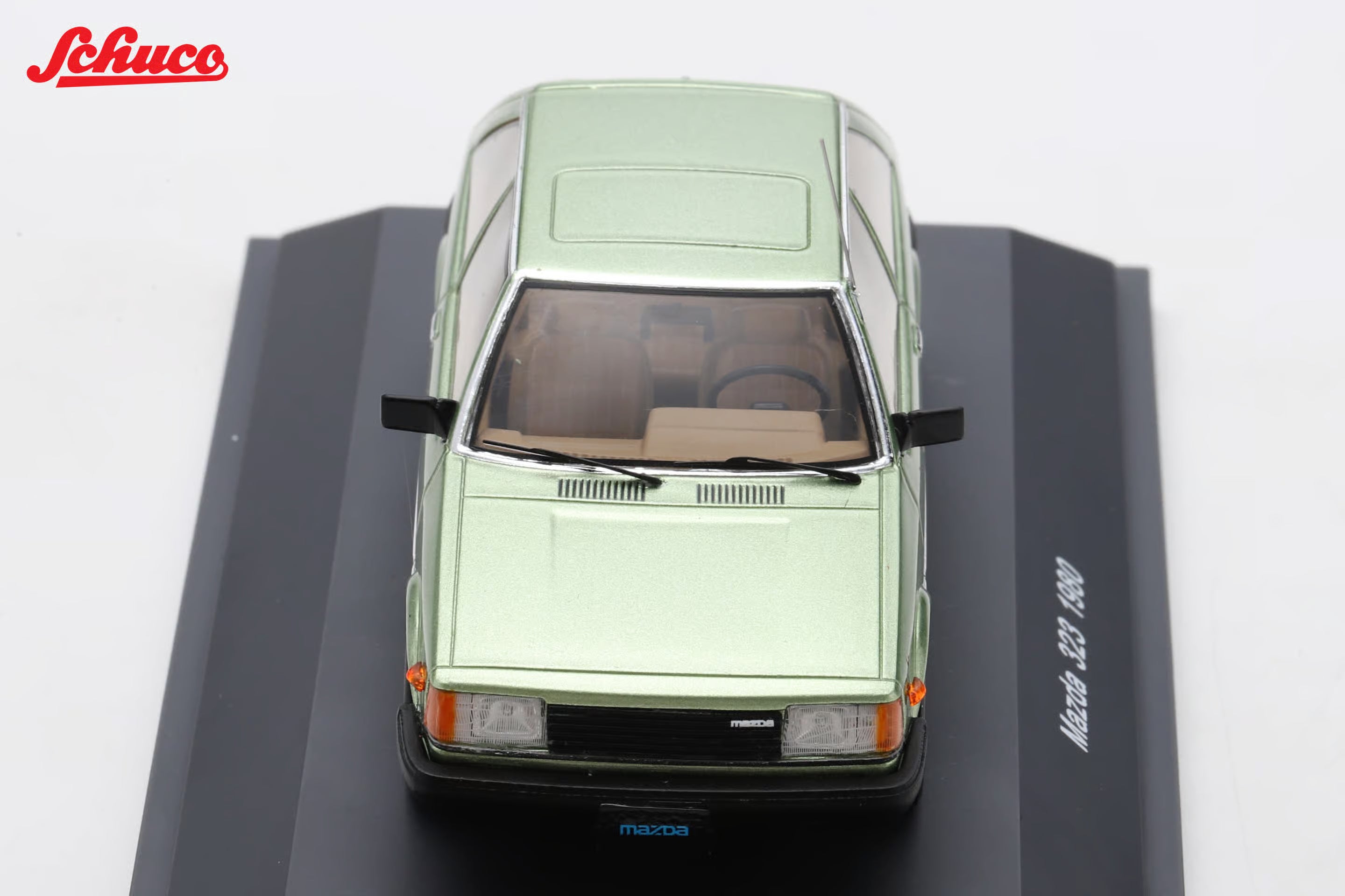 Mazda 323 light met green (Euro version) 1:43