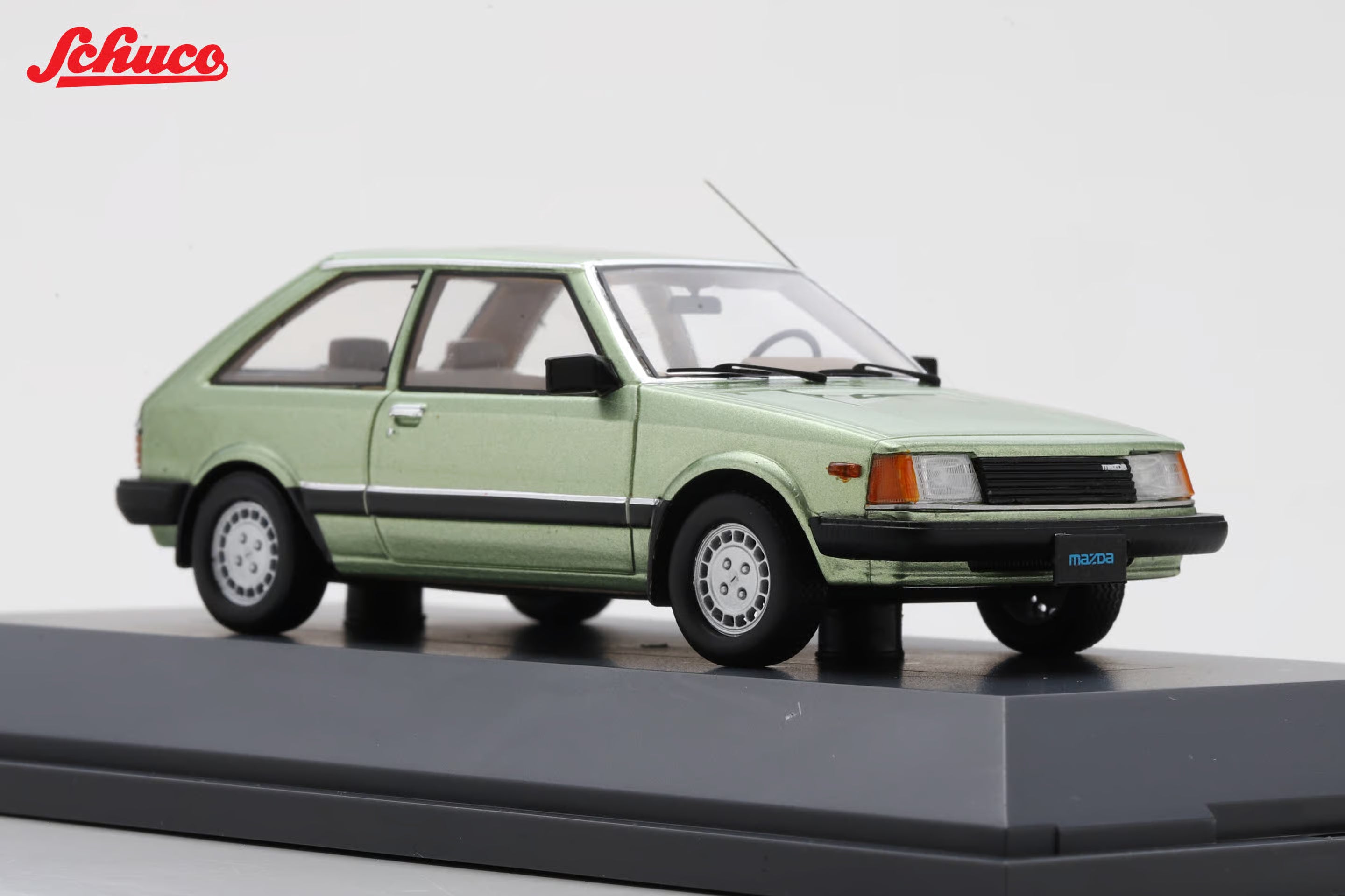 Mazda 323 light met green (Euro version) 1:43
