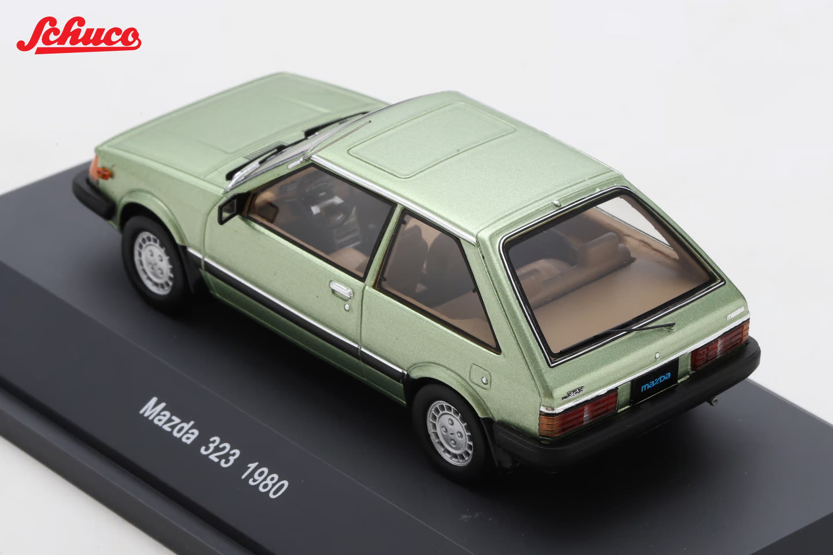 Mazda 323 light met green (Euro version) 1:43