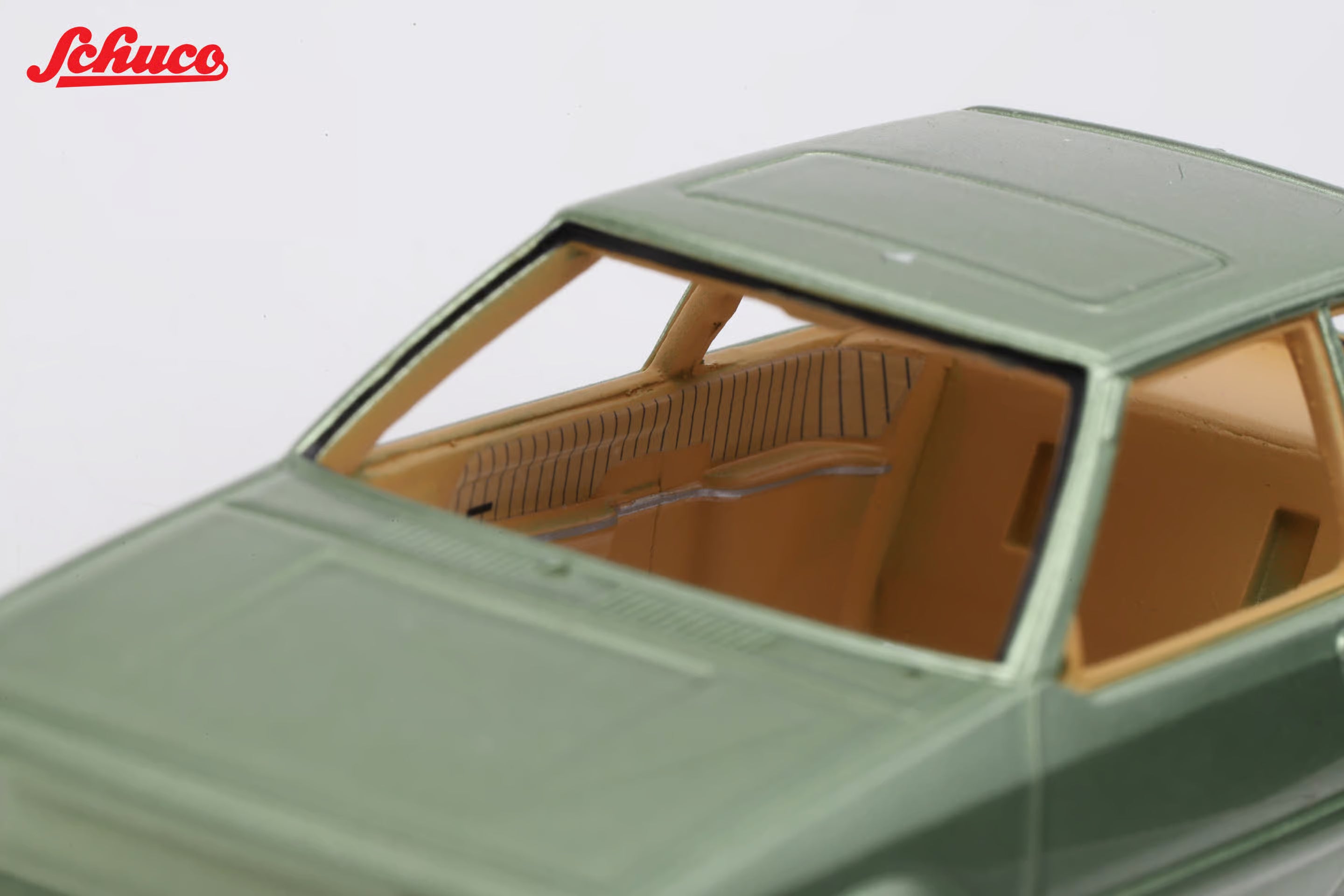 Mazda 323 light met green (Euro version) 1:43