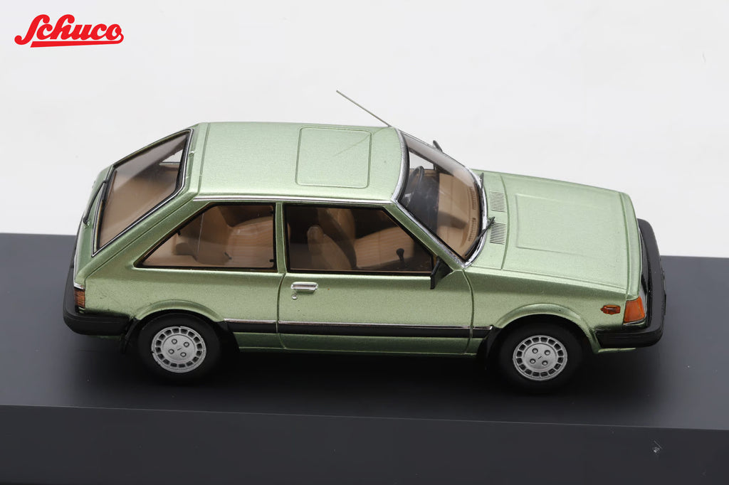 Mazda 323 light met green (Euro version) 1:43