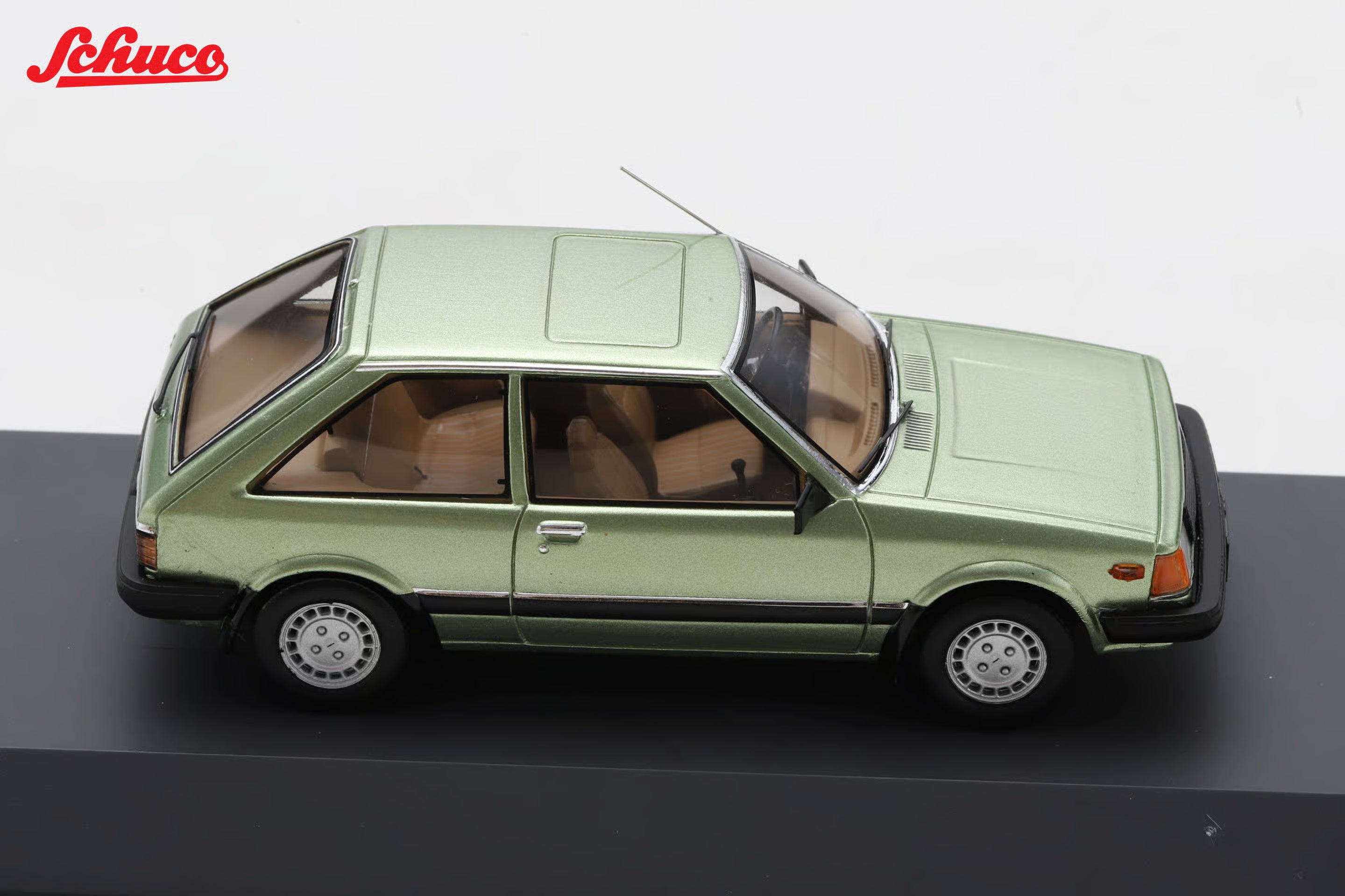 Mazda 323 light met green (Euro version) 1:43